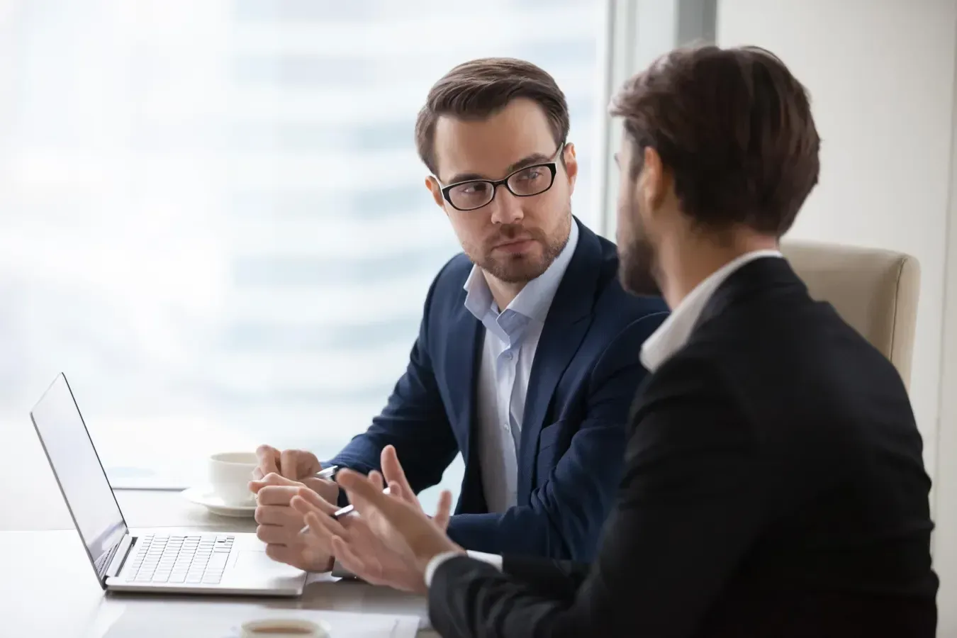 A consultant in a meeting